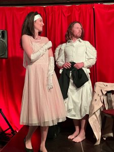 Two actors in costume play at The Actors Circle Berlin